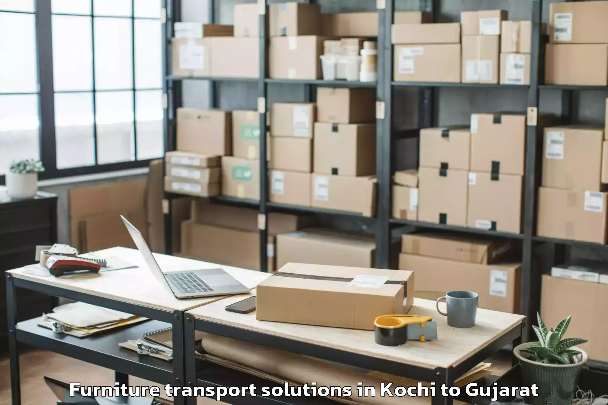 Book Kochi to Jhagadia Furniture Transport Solutions Online